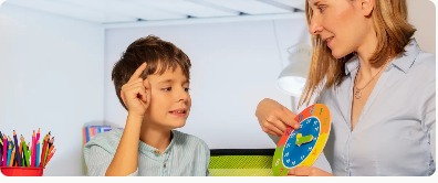 Adult guiding a child through a colorful learning activity
